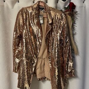 City Chic Rose gold sequin blazer
Brand new still has tags.  Size 14W